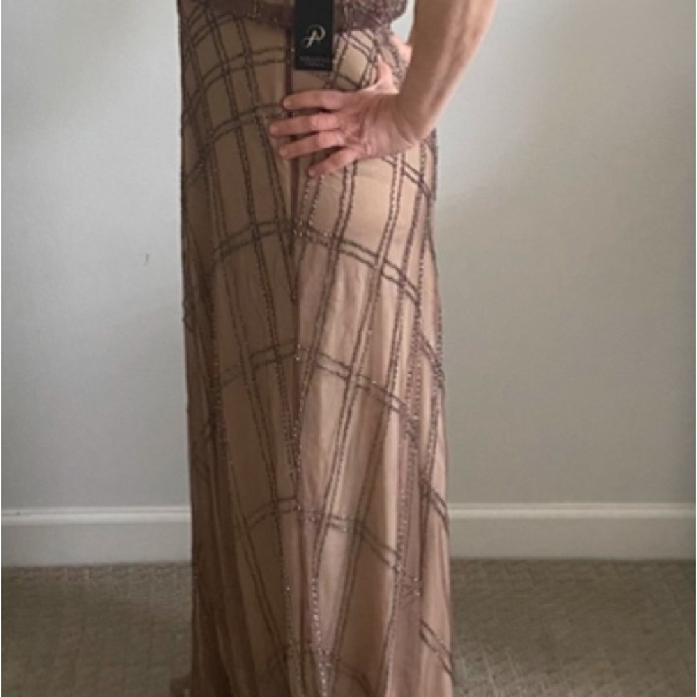 This brand new maxi dress is perfect for a special occasion.